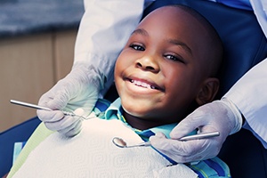 Smiling child in dental chair