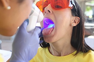 Patient receiving oral cancer screening