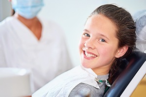 Smiling child in dental chair