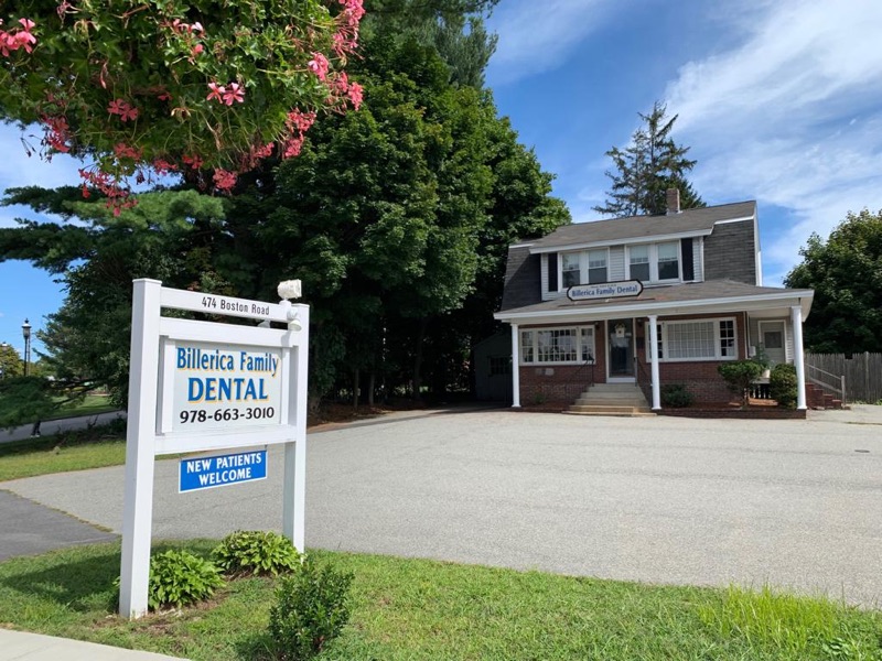 Billerica Family Dental office exterior at 474 Boston Road in Billerica, MA &mdash; street sign and brick colonial dental office building.
